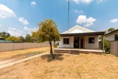 17 Bogong Place TUMUT NSW 2720 $165,000 Positioned to the rear of a large 835m2 fully fenced allotment, this partially renovated two-bedroom home offers great potential. Comprising of a renovated kitchen that flows freely to the large open living, with its very own study nook, wood fire heater and split system air conditioning, perfect for that all year-round comfort. Do not miss your opportunity to secure such a great opportunity, call and book an inspection today! Premiere Features: - Two good size bedrooms with built in robes - Additional study sized room to the rear of the plan - Modern kitchen with electric cooktop, tiled splash back and stainless appliances - Large open living area with split system air conditioning and wood box fire heater for all year-round comfort, with additional large study nook - Bathroom with large separate shower and single vanity - Separate toilet - Internal laundry with direct side yard access - Fully covered front deck positioned off the main living area - Two secure garden sheds positioned to the rear of the block - Additional wood storage shed - Fully fenced 835m2 allotment The home has recently been partially renovated including re-plastering, new electrical, tiling, flooring and painting throughout and amenities. (please note, there is minor painting and carpets to be completed) Do not miss your opportunity to secure a home with such potential in a great location. The property must be sold at auction!