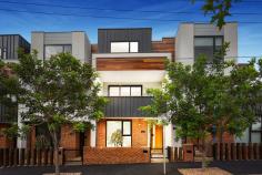 2/62 Smith Street Kensington VIC 3031 Immerse yourself in this brand new luxurious living with this brand new three bedroom/three bathroom townhouse superbly positioned 4.5km from the CBD and just walking distance to Newmarket Plaza, Kensington Village, Flemington Racecourse and a choice of train stations. Immediately impressive, the homes bold architectural design begins with a sleek and striking façade, alluding to the quality, sophistication and style that feature within. North facing living domain and sublime gourmet kitchen delivers seamless flow and reveal a gas Miele cooktop, oven, undermount rangehood and dishwasher plus lustrous stone lined counters and ample cabinetry. Three lavish bathrooms, two being ensuites, service the residences three bedrooms, all with BIRs. Discover true urban excellence for yourself and reap the benefits of city fringe living.