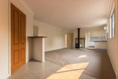 17 Bogong Place TUMUT NSW 2720 $165,000 Positioned to the rear of a large 835m2 fully fenced allotment, this partially renovated two-bedroom home offers great potential. Comprising of a renovated kitchen that flows freely to the large open living, with its very own study nook, wood fire heater and split system air conditioning, perfect for that all year-round comfort. Do not miss your opportunity to secure such a great opportunity, call and book an inspection today! Premiere Features: - Two good size bedrooms with built in robes - Additional study sized room to the rear of the plan - Modern kitchen with electric cooktop, tiled splash back and stainless appliances - Large open living area with split system air conditioning and wood box fire heater for all year-round comfort, with additional large study nook - Bathroom with large separate shower and single vanity - Separate toilet - Internal laundry with direct side yard access - Fully covered front deck positioned off the main living area - Two secure garden sheds positioned to the rear of the block - Additional wood storage shed - Fully fenced 835m2 allotment The home has recently been partially renovated including re-plastering, new electrical, tiling, flooring and painting throughout and amenities. (please note, there is minor painting and carpets to be completed) Do not miss your opportunity to secure a home with such potential in a great location. The property must be sold at auction!