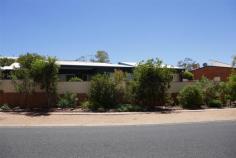 6/24 Bokhara Street LARAPINTA NT 0875 $385,000 Architecturally designed and built, this 2-bedroom, 2-bathroom, 2 car park unit, is perfectly positioned in a six-unit complex, and is unparalleled for quality, workmanship, and design. In addition to this, aspects such as privacy, security, views, close proximity to shops, schools transport, and sporting facilities, and you have the complete package. Luxury features include: —- An entrance hall that invites you inside to the spaciousness that awaits you. Large open space living area with cathedral ceilings and lots of natural light. 2 large bedrooms; the main with a walk-in robe and en suite bathroom. The second bedroom has floor to ceiling robes and is across the passageway from a fully equipped bathroom and separate toilet. Designer kitchen with gas cooking and quality appliances, adjacent to the living/dining areas, allowing the opportunity to enjoy the company of family and friends, whilst cooking up a stormgreat for entertaining. Well-appointed laundry with lots of room. Gas cooking, fully ducted air conditioning throughout, with additional split system reverse cycle cooling and heating to living area, ceiling fans and down lights, with quality blinds, curtains, and flooring, throughout. Landscaped rear courtyard area to sit, relax, and enjoy the aspect of the nearby mountain range. This is truly the one with the lot..