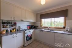 3/227 Wynyard Street TUMUT NSW 2720 $245,000 You will love the low maintenance lifestyle in this high set brick home set upon 446m2 allotment overlooking the picturesque Tumut golf club and leafy surrounds. Boasting three good sized bedrooms, open plan living, privately positioned bathroom and fully fenced front and side yards. All with your very own, very private fully covered deck. You can simply move in and enjoy the relaxed feel of this well-maintained brick home being offered to market for the first time in almost nineteen years. Do not miss your opportunity, call today and book your own private inspection! Premiere Features: - Three great sized bedrooms with the master positioned to one end of the plan - Modern bathroom with separate shower, bath and single vanity - Great sized gas kitchen positioned to capitilise on the elevated aspect and great storage options and work space - Open plan living/dining with timber flooring, split system air conditioning and direct access to the covered deck - Quaint front deck, fully covered capturing the leafy outlook - Internal laundry with direct rear yard access - Separate toilet - Fully fenced front and side yards - Large car port - 446m2 elevated allotment - Gas hot water - Secure under house storage options Do not miss your opportunity to secure such a great opportunity, call to book your inspection!