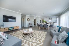 3 Malvern Rd Butler WA 6036 $519,000 - $539,000 This Home presents immaculately and has all the additional extras you expect from an ex display home offering the best of both worlds and in a great location close to local amenities schools and the beautiful Eden beach only a short stroll away, there's nothing for you to do but unpack,relax and enjoy, it truly has something for the whole family. Upon entry through a large feature glass front door you will be greeted by a impressive entrance hallway with 34c feature ceilings and modern coving. The master bedroom with its soaring high ceilings feels like a resort,from the spacious walk in robe to the expansive ensuite with double vanity and stone bench top to the large double shower and separate bath. Just off the hallway and through the double glass door is the theatre room,the perfect haven after a long week to relax and watch a movie with the whole family. The stylish and contemporary kitchen is the hub of this home with 20mm stone benchtop to the waterfall edge on the breakfast bar ,top quality appliances and large walk in pantry complement this expansive kitchen , the adjoining living and dining area opens out to the manicured garden and undercover al fresco ,making it perfect for entertaining. To the rear of the property is the well appointed 3 remaining bedrooms with stylish window treatments and double frosted sliding robes, you will also find the study area or activity area for the kids to hangout with friends. The main bathroom is complete with shower ,vanity and bath and there even a powder room for guests, you will also find the laundry room with ample storage ,long benchtop and floor to ceiling sliding linen robe. OTHER FEATURES Front entry porch with high ceiling to hallway 34c ceilings to Hallway and master bedroom Feature ceiling to theatre room with double glass doors Contemporary coving throughout Quality stainless steel appliances Large walk in pantry Soft close drawers 20mm stone bench tops to kitchen with waterfall edge to breakfast bar Quality blinds and voile Chrome downlights throughout Clipsal slimline light and power points throughout Daikin air conditioner zoned Alarm system Double remote garage Undercover alfresco Reticulated front and rear gardens and so much more !!!