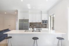2 Price Parkway Milton NSW 2538 $989,000 A showcase of contemporary design, this oversized, single level home provides flawless interiors, space, privacy and the peace needed for effortless family living. With it’s ideal location, set against the stunning backdrop of the Budawang Ranges this property is situated just a short distance from parklands, excellent schooling, public transport, shops and all amenities. Consisting of a four bedroom home with multiple living and entertaining options with generous proportions throughout, with the added bonus of a fully self contained one bedroom unit with separate access. This immaculate family home is one you must take a look at, offering low maintenance living combined with stunning, sophisticated interiors making this the perfect carefree investment. Superb quality throughout, the open plan living is a light-filled space with huge windows and doors. The modern kitchen has stainless steel appliances, a dishwasher, and Caesar stone bench tops. A generous built-in-robe and ensuite make the spacious master bedroom a true sanctuary. The home boasts bedrooms with built-ins and a central stylish fully tiled bathroom. Covered entertaining areas, a great addition to the fully secured backyards with space for the kids to play and pets to roam. The double lock up garage conveniently offers internal access into the house, plus there is side access allowing space to store a caravan or boat. – Two residences under one roof – Level and low maintenance yards – Corner block, fully fenced with side access – Rendered brick home with Colorbond roof – Remote double garage, internal and remote access to the home with extra built-in cupboards and laundry. – Excellent investment opportunity with unit attracting strong rental returns – Ceiling fans throughout, reverse cycle air conditioning and wood fire in main residence – Main bathroom is stylish and functional with a shower and bath – Easy-care tile and carpeted floors This much-loved home is an absolute stand out. Great opportunity to gain an income either on a permanent basis or temporary holiday accommodation. Ideal for the extended family for either elderly parents, teenagers retreat or perfect for guests. A house suited for many purposes, conveniently located within close proximity to all amenities including schools, shops and dining and transport only minutes away. Don’t miss this opportunity, you have a beautiful family home to move straight in and enjoy. Call today for more information.