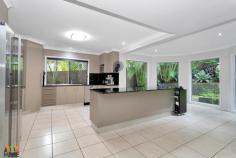 42 Fairmeadow Dr Mount Pleasant QLD 4740 $649,000 STUNNING, ELEVATED, PERFECTLY LOCATED, MOUNT PLEASANT MANSION! You will not need to lift a finger when you enter this majestic Mount Pleasant family home that boasts a full renovation & 5 bedrooms plus an office! This double storey grand family home could host the busiest of families with ease, presenting a cascading carpeted staircase upon entry through the impressive double door entrance. DOWNSTAIRS: An electric sliding gate works on remote control & provides excellent security & extra grandeur, leading to a double bay remote garage that leads directly into the lushly turfed backyard or straight into the laundry for an easy drop off of groceries or school bags. A cosy media room has plush Eco-carpets (hard wearing, easy maintaining, pet friendly) & sliding cavity doors, making family movie night a very intimate affair! The fifth bedroom is the only bedroom located downstairs; however, it is currently being used as a spacious office which would be fantastic for anyone wanting to run a home-business in such a central location. Also on the downstairs level is a third toilet & powder room, so guests aren't required to utilize the main bathroom upstairs; & the generously sized laundry with brand new splash backs. The kitchen is an Entertainer's Dream, being framed by 4 amazing fixed glass panels which allows the entire space to be flooded with natural light & invites the lush surrounding gardens inside! The granite top island bench is ideal for casual cuppas or children doing homework, but the best part is that this very modern, well-appointed kitchen flows seamlessly to the air-conditioned formal dining area &, via sliding glass doors, to the outdoor entertaining area. The outdoor area is just sublime, being totally covered yet surrounded by landscaped, lush gardens that make you feel like you're at your own private resort! The gardens also provide excellent privacy, are very low maintenance & are all on an automatic watering system so that you have all year round greenery! UPSTAIRS: Via plush carpeted stairs, you are greeted with a mezzanine-style open space that boasts a second office or an upstairs lounge room. This space could be utilized for many purposes, constantly enjoying cool breezes thanks to the great cross-ventilation through the entire home. All four bedrooms on the upstairs level are generously sized, individually air conditioned, with built-ins & luxurious carpet, with the Master Suite boasting a walk-in robe & the most stunning of renovated ensuites. The entire ensuite is tiled floor to ceiling, with one wall displaying a striking feature tile, giving depth & texture. It also boasts a large walk-in shower, modern ceramic-top double vanity, and matching shaving cabinet with discrete LED under lighting. The main bathroom has also been renovated in a similar style, presenting a striking bath tub, large frameless shower & customized vanity. LOCATION: In the heart of Mt Pleasant, situates you minutes from everywhere & provides peace of mind from any flooding concerns with great elevation. Be walking distance from the Cinemas, World Gym, Baskin-Robbins, takeaway, medical and major retail including Mt Pleasant Shopping Centre. Homes of this grandeur are snapped up very quickly so be quick to purchase your 'forever-home' & live the most convenient of lifestyles!