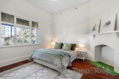 36 Da Costa Ave Prospect SA 5082 A Very Pretty Prospect This alluring 1924 return veranda bungalow has all the right ingredients for enviable lifestyle living. Located in the premiere corner of Prospect, it’s merely moments to the convivial Prospect Road, less than 2kms to iconic North Adelaide and just minutes to the CBD. The enchanting façade is just a taste of the magic that is within. Polished Jarrah floorboards, soaring ceilings, architraves, ceiling roses and fireplaces all contribute to it’s cute period charm. There is not an ounce of energy to be exerted, all the hard work has been done. A brand-new designer kitchen with stainless Westinghouse 900mm cooker ensures that every meal at this address will be a happy meal. The well-proportioned dining/living room captures a wealth of natural lighting offering a relaxing space to unwind and recharge together or alone. Double doors open out onto the rear patio providing seamless indoor/outdoor entertaining. The accommodation consists of three generous bedrooms, all serviced by the main bathroom. The laundry has been freshly renovated with plenty of storage. Entertaining is a breeze with the north facing undercover paved patio offering a generous landscape to host friends and family whilst dining and imbibing. Lush gardens and immaculate lawns are a reflection of the strict care given to this home and its surrounds. A powered garage/shed provides storage space for a vehicle or the perfect place for the humble home workshop. Additional Features: - Daikin zoned reverse cycle A/C - BIR in Bed 1 - Motorised roller shutters in kitchen and living area. - Instant gas hot water and gas cooking