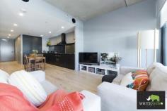 UNIT 78/43 EASTLAKE PARADE KINGSTON ACT 2604 $550,000-$595,000 Ideally Located on the Kingston Foreshore, this spacious modern two bedroom, two bathroom apartment is a haven of undeniable appeal and modern comfort. This apartment is inner south living at its finest, only moments to the heart of the CBD. 'Element' is one of Canberra's foremost waterfront developments, ideally positioned in the heart of the Kingston Foreshore, offering a world-class array of restaurants, nightlife & speciality stores along the bustling boardwalk. Live the urban lifestyle you have always wished for with Element, located within only a short drive to Manuka & the City, offering a variety of retail, entertainment & leisure options. Boasting a level 2 location with a functional floor plan, offering open plan living space with a neutral colour scheme & light filled living spaces, this apartment is sure to impress!! The stylish kitchen includes appliances by Miele, stone benchtops & plenty of cupboard space – perfect for storing all your essentials. Enjoy timber floorboards to the living area, a spacious balcony area & secure basement parking. This spacious and stylish apartment would suit an owner occupier, or an investor looking for a property with a high rental return (currently leased at $750pw). Features of this quality apartment include: - Two generous sized bedrooms - Level 2 location - Ducted reverse-cycle air conditioning - Intercom access - Lift access - Astra Walker matte black tapware throughout - Timber floorboards to the living areas - Miele cooking appliances - Omega dishwasher - Ensuite to the main bedroom - Balcony area with views - Plenty of storage throughout - Rooftop gardens, BBQ areas with stunning waterfront views - Cinema room located within the complex - allocated basement car spaces with storage area - Facilities includes roof top BBQ and entertaining area, private theatre and push bike hire exclusive to residents Total Apartment size: 91.5sqm (approx) Internal size: 79sqm (approx) External size: 12.5sqm (approx) Disclaimer: Whilst every effort has been made to ensure the accuracy of the above and attached information, no warranty is given by the agent, agency or vendor as to their accuracy. Interested parties should not rely on this information as representations of fact but must instead satisfy themselves by inspection or otherwise…