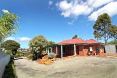 11B Bavin Street Denmark WA 6333 $320,000 This gorgeous, 3 bedroom, 1 bathroom, double brick home sits in an elevated location with big views over the Denmark River to the Wilson Inlet and Nullakai Peninsula. It's tucked away off the road at the end of the driveway, with a garden shed, carport and extra parking for a trailer/vehicle. The front patio is perfect for a morning cuppa watching the sunrise, or an afternoon drink to wind down. It has gas HSW, gas stove, slow combustion fire, ceiling insulation, established low maintenance gardens and full length tub for a soak. Close to town, easy to manage and a pleasure to present to the market.