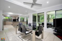 42 Fairmeadow Dr Mount Pleasant QLD 4740 $649,000 STUNNING, ELEVATED, PERFECTLY LOCATED, MOUNT PLEASANT MANSION! You will not need to lift a finger when you enter this majestic Mount Pleasant family home that boasts a full renovation & 5 bedrooms plus an office! This double storey grand family home could host the busiest of families with ease, presenting a cascading carpeted staircase upon entry through the impressive double door entrance. DOWNSTAIRS: An electric sliding gate works on remote control & provides excellent security & extra grandeur, leading to a double bay remote garage that leads directly into the lushly turfed backyard or straight into the laundry for an easy drop off of groceries or school bags. A cosy media room has plush Eco-carpets (hard wearing, easy maintaining, pet friendly) & sliding cavity doors, making family movie night a very intimate affair! The fifth bedroom is the only bedroom located downstairs; however, it is currently being used as a spacious office which would be fantastic for anyone wanting to run a home-business in such a central location. Also on the downstairs level is a third toilet & powder room, so guests aren't required to utilize the main bathroom upstairs; & the generously sized laundry with brand new splash backs. The kitchen is an Entertainer's Dream, being framed by 4 amazing fixed glass panels which allows the entire space to be flooded with natural light & invites the lush surrounding gardens inside! The granite top island bench is ideal for casual cuppas or children doing homework, but the best part is that this very modern, well-appointed kitchen flows seamlessly to the air-conditioned formal dining area &, via sliding glass doors, to the outdoor entertaining area. The outdoor area is just sublime, being totally covered yet surrounded by landscaped, lush gardens that make you feel like you're at your own private resort! The gardens also provide excellent privacy, are very low maintenance & are all on an automatic watering system so that you have all year round greenery! UPSTAIRS: Via plush carpeted stairs, you are greeted with a mezzanine-style open space that boasts a second office or an upstairs lounge room. This space could be utilized for many purposes, constantly enjoying cool breezes thanks to the great cross-ventilation through the entire home. All four bedrooms on the upstairs level are generously sized, individually air conditioned, with built-ins & luxurious carpet, with the Master Suite boasting a walk-in robe & the most stunning of renovated ensuites. The entire ensuite is tiled floor to ceiling, with one wall displaying a striking feature tile, giving depth & texture. It also boasts a large walk-in shower, modern ceramic-top double vanity, and matching shaving cabinet with discrete LED under lighting. The main bathroom has also been renovated in a similar style, presenting a striking bath tub, large frameless shower & customized vanity. LOCATION: In the heart of Mt Pleasant, situates you minutes from everywhere & provides peace of mind from any flooding concerns with great elevation. Be walking distance from the Cinemas, World Gym, Baskin-Robbins, takeaway, medical and major retail including Mt Pleasant Shopping Centre. Homes of this grandeur are snapped up very quickly so be quick to purchase your 'forever-home' & live the most convenient of lifestyles!