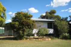 10 Twine St Dalby QLD 4405 $258,000 Family home close to South School... 3 bedroom home with air conditioned lounge and family rooms & fans throughout. The combined kitchen/dining and lounge area have polished floors. Additional outdoor entertainment area & a cubby house for the kids. Lockable carport with roller door for access to backyard. Fully fenced back yard for children & pets...