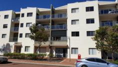 5/88 Lakeside Dr Joondalup WA 6027 $289,000 RITZY TWO STOREY JOONDALUP CBD APARTMENT Spacious, modern 2 storey apartment. Lift access to first floor internal staircase. Ground floor incorporates entrance from front of building and 24m2 of multi-use space. Ideal for home business operation or a second bedroom. Upstairs is a spacious one bedroom apartment of approx 56m2 plus 10m2 of balcony, one allocated car bay and a storeroom. Centrally located in modern complex with pool and under cover BBQ area. The total strata area allocation is 107m2 which represents outstanding value. Be quick to secure this as an investment or live in opportunity. Must inspect to appreciate the value. Area Breakdown: Internal apartment – 80 sqm Balcony – 10 sqm Carpark – 13 sqm Storeroom – 4 sqm Features Air Conditioning Built-In Wardrobes Close To Schools Close To Shops Close To Transport Secure Parking