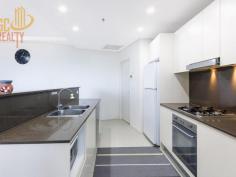 3713/15 Charles Street Canterbury NSW 2193 $665,000 This spacious 2 bedroom apartment is Located in the center of Canterbury Town Center retail precinct, only 3 minutes’ walking to train station, Woolworth, surrounded by Cook River, lush green park, Aquatic and fitness center, shopping and all amenities. Within easy access to the airport and Sydney CBD. •Bright and airy open plan living and dining area with tilt floor throughout, access to entertainment balcony. •Stylish and modern designed gas kitchen with granite bench top, quality stainless steel appliances and dishwasher. •Spacious Master room with walk-in drobe. •Large second bedroom with built-in, and access to balcony. •Internal laundry with dryer. •Duct air-con. •Security car park. •Only 3 minutes’ walking to train station. Please contact Echo Bai on 0401721388 for details….