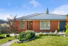 16 Orchard Avenue Huonville TAS 7109 $525,000 Nestled in beautiful rural settings with wonderful views of the surrounding apple orchards, this spacious family home is a very unique buy. Built in 2016 the home has been designed with family living at the forefront, with 2 living areas as well as an open plan kitchen and dining space. Large gatherings and entertaining will be comfortably accommodated in this home. The house is fully insulated through the walls and ceiling and combined with the double glazing and efficient reverse-cycle heat pump, heating and cooling the house is a breeze and light on the purse. There is a short 3 minute drive to the heart of Huonville offering all the shops and services one could possibly need. Only 30 minutes to Hobart's CBD with numerous transport options the property offers country-style living with all the conveniences one could want. The spacious kitchen features stone bench tops, quality appliances & a breakfast bar. The master suite is light filled and has a large walk-in robe and well appointed en suite with fully tiled shower. The remaining bedrooms all feature built in wardrobes and are serviced by a large main bathroom with separate bath, fully tiled shower and plenty of storage offered by the vanity. The backyard has been landscaped perfectly and has its own private garden with numerous fruit trees, a large chicken coop, with plenty of additional space for play, sheds or big veggie patch, offering the ability for self sufficiency in years to come. Attached to the house is a large entertainer's deck with views over the paddocks, orchards and north towards iconic Sleeping Beauty. • Open Plan Living, Kitchen & Dining • Fully Double Glazed and Insulated • Master Suite with Walk-In Robe and En suite • 3 Bedrooms with Built-In Robes on other end of the house for enhanced parental privacy • Potential 5th bedroom or study adjoining the deck • Well Appointed Kitchen with Stone Bench Tops and Quality Appliances • Bathroom with Tiled Shower and Separate Bath • Large Entertainers Deck and Backyard • Big SUV garage space • Close to Shops, Transport and Services..