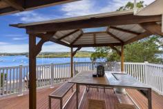 36 Henderson Rd Saratoga NSW 2251 $1,750,000 To $1,850,000 Presiding over Brisbane Waters, this totally unique property is elevated and whisper quiet with endless cinematic views. Select a balcony and make it your private haven to relax, cool off in the new pool or wander down to the waterfront and take the boat for a cruise. With so many options, the choice is really up to you. OPTIONS, OPTIONS & MORE OPTIONS. Family home/guest home Family home/teenagers or extended family Family home/investment property with rental Family home/home based business Two investment properties OR just enjoy and keep the whole property for yourself Features of this incredible property include: MAIN HOUSE • GROUND FLOOR • Gigantic master retreat, dressing room & water views • Full bathroom, study and deck • FIRST FLOOR • 3 bedrooms and 2 bathrooms • 4th bedroom has en-suite and kitchenette with separate access • Formal living, multiple views and wrap around balcony • Modern kitchen formal dining • Mineral magnesium pool, heat pump and viewing platform • Shared jetty and boating berth • Level grass play area for the kids • 1850 sqm block – Landscaped with sealed driveways and parking • 10 sec walk to ferry & bus stop • 2 min drive to shops & school GUEST HOME • 2 large bedrooms • Open plan kitchen & dining • Full kitchen & bathroom • Full water views and level ground access – Covered deck • 2 x single lock up garages both with internal access – Plus off street parking • Internal laundry and designated storage rooms • IDEAL guest accommodation, extended family, AIRBNB, permanent rental 2nd income or home based business Call Anthony McVicker on 0498 112 351 to inspect this outstanding property..