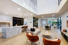 150 James St, New Farm QLD 4005 A sophisticated statement in contemporary luxury, drawing inspiration from the most forward-thinking global inner-city designs. This five-bedroom, four-bathroom architectural masterpiece delivers a cutting-edge cosmopolitan flair to Brisbane's New Farm. Garnett on James is the result of Capital Luxury Residences' desire to produce the ideal contemporary family home, one which is equal parts functional and aesthetic. Internationally influenced, reflected in bespoke cabinetry from Milan and marble from Italy and Spain, with a laser local focus on creating a 402sq m open-plan layout offering year-round comfort in Queensland's tropical climate. An inviting swimming pool and level backyard also feature prominently in a home which has been future-proofed with smart technology. Defined by its grand living spaces and pioneering design showcasing a white Afghan marble staircase, Garnett on James celebrates and welcomes the Australian family lifestyle. Garnett on James offers but is not limited to: Capital Luxury Residences + interior designer Alissa Birch + Big House Little House 405sq m block with 402sqm of living and entertaining Architectural white marble staircase, cantilever gas fireplace, feature pendants Open-plan design with multiple formal and casual living and dining areas Gas and induction kitchen w integrated premium appliances, butler's pantry Five bedrooms, each with its own ensuite featuring Afghan white marble Master with WIR, oversized ensuite with bathtub and Juliette balcony Custom timber veneer wine room with Vintec wine fridge Bespoke timber veneer cabinetry with Cinderella marble benchtops Enclosed tiled alfresco area with fully-fitted outdoor kitchen inc 5-burner bbq Family-friendly level backyard with automated sprinkler and lighting systems Swimming pool with spa and water feature Two-car accommodation, outdoor storage area for bikes etc Walk to the CBD, Howard Smith Wharves, New Farm Park, Gasworks