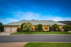 32 Clem Dr Glenroy NSW 2640 $598,000 *The real triumph of this home is the connection between the interior & exterior that flows into an extremely rare kaleidoscope of colorful and scenic views. * A welcoming generous formal entrance creates a dramatic ambiance leading to large light filled living and dining areas containing huge windows which frame the immaculate views that change with the seasons all year round. * A dynamic kitchen with a large breakfast bar, quality appliances suitable for the most discerning MASTERCHEF. This adjoins an informal meals area and a huge family room ideal for the large families plus a large entertaining area and a wrap around verandah. * A deluxe five star main bedroom complemented by a walk-in-robe as well as a built-in-robe and a generous ensuite, plus another other 3 double sized bedrooms with built-in-robes with bedroom 4 having a sliding door to the verandah and which is ideal for a home office. * Also on offer is an extra-large rumpus/games room, full bathroom with a corner spa, separate powder room, separate laundry, ducted heating and cooling. This home is also freshly painted throughout with brand new carpet and much more. * Add to this list a double lock-up garage with remote and internal access, landscaped gardens, secure yard, exciting huge undercover carport with a separate driveway designed to accommodate a speed boat or a large caravan, plus a workshop with power and massive under house storage. This huge yet stylish home provides superb family accommodation and lifestyle at every turn, allowing comfort and versatility combined with grace and distinction. The home is nestled in a newly developed and quiet area in NORRIS PARK, surrounded by quality modern homes, close to sports ground, schools, park and shops. A home of exceptional size, this is a very rare find in a home that satisfies everyone's needs both indoor and out!!
