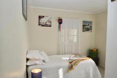 44 Coombabah Road Biggera Waters QLD 4216 $649,000 PRIME PEICE OF LAND- 594m2 with two street access. Over 50 metres of street frontage How scarce are these opportunities? First time on the market for 37 YEARS. ( Built 1961 ) The options with this property are endless. Presently the existing 3 bedroom cottage ideally sits to the front of the block.Thus, freeing up the rear of the block for additional usage e.g. Granny flat, Boats, Trailers, Campervans, Tradesmans accessories. Additionally, investors may "Landbank" in view of the upcoming greater density town plan. The existing cottage is a neat & tidy weatherboard dwelling with charm & character. It has 3 bedrooms, 1 bathroom, a single lockup garage plus 2 undercover entertaining verandahs.The home has a solid hardword structure with a current rental appraisal of $490- $520 p/w. With this in mind, investors can rely on a healthy return while considering the "add value" options for the underutilised rear portion of the block. There is extensive refurbishment occuring within this neighbourhood. The location is sensational with the Broadwater, Shops, Schools, Cafes, Restaurants + Hospital all conveniently located. An excellent investment But equally a superb position to reside for many years to come. Contact Richard on 0423588890 to arrange an inspection..
