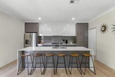 1 SANDRA AVENUE TEA TREE GULLY SA 5091 $709,000-$749,000 Built in 2019 with grand design and proportions this 350 sqm residence is suitable to accommodate a growing family in contemporary comfort and style. This two storey four bedroom residence sits proudly on the high side of a tree lined street on a traditional 573 sqm allotment providing elevated creek and urban views. The design accommodates the main bedroom on the lower level with the other 3 bedrooms and study located on the upper floor. There's a dedicated living room per level providing plenty of internal living space to accommodate a family with children of all ages. In addition the alfresco and balcony provide a choice of outdoor options to entertain, barbecue or sit back, relax and enjoy the creek views and summer breezes. Surrounded by a mix of quality established homes and new construction in a popular foothills location within walking distance to public transport, schools, cafes, St Agnes Shopping Centre and a 5 minute drive or bus ride to Tea Tree Plaza and the O-Bahn interchange. Additionally for those with a passion for the outdoors, the scenic Anstey Hill Recreation Park and Angove Park Conservation reserve are in the immediate area providing a well balanced lifestyle location for all to enjoy. It's time to treat the family to a substantial home ready to provide comfort and space for all to enjoy for years to come. Features: -Total dwelling size of 353 sqm (approximate) -4 double bedrooms + separate office/study -2 separate living areas includes lower level open plan living & meals with direct access to the Alfresco + a large upper level carpeted family room with direct access to the balcony -Well equipped kitchen with stone bench-tops, butler's pantry, 900 wide oven & 5-burner gas stove -Main bedroom with walk thru robe and deluxe ensuite -Cleverly designed main bathroom -3rd toilet / powder room located on the lower level -Reverse cycle ducted air conditioning -2.7 metre high ceilings -Study/office with built-in furniture -LED energy efficient lighting -Quality fixtures and fittings -Abundance of storage -Tiled alfresco -Tiled balcony with automated cafe blinds -Double garage with internal access + remote automated panel lift door -Secure off-street parking available -Fully fenced 573sqm allotment Year built: 2019 (Construction completed November 2019) Land size: 573 sqm (approximate) Dwelling size: 353 sqm (approximate) Council: City of Tea Tree Gully Council rates: Matthew Lee MichaelKris Real Estate RLA 212749..