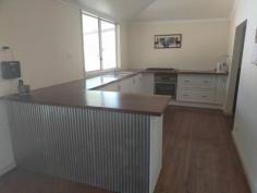 47 Railway Terrace Beachport SA 5280 $260,000 Ideal for first home buyer or accomodation for companies to use for workers in fracking industry, pastoral managers residence or just a retiree wants a nice home in a quiet town. The home has been fully renovated. Feature African Mohogany kitchen benchtops and lots of cupboards. Nice modern bathroom with twin shower heads. Cypress Pine floors. Two massive bedrooms with design that would allow to turn the home into four bedrooms with minimal work. Easy to install another bathroom as well. Internal laundry. 6m x 6m Colourbond lockup zincalum shed. Verandah overlooks rear yard and shed. Septic and town water. Property is off the highway and second last house on Railway Terrace. Property is fully furnished and offered WIWO Chattels furniture list includes 3 seater lounge, 2 x double size armchairs, washing machine, fridge etc, Ford station wagon for dumping rubbish..