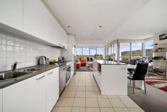 49/2 Edinburgh Avenue City ACT 2601 $590,000 - $640,000 THIS PROPERTY WILL BE GOING TO AUCTION ON THE 26TH JUNE AT 12PM ONLINE Welcome to the easy & convenient living that 49/2 Edinburgh Avenue has to offer! Located on the 5th floor in The Metropolitan' is this two-bedroom ensuite unit which would be the perfect fit for a young couple or investor-ready for you to move into! Two great sized bedrooms main bedroom with a walk through robe into the ensuite and the second bedroom having sliding door access into the dining room. The kitchen has stone benchtops, quality stainless steel appliances, and ample cupboard space, along with a large island bench for all your needs. The apartment has uninterrupted views of the Telstra Tower and Black Mountain with open plan living and dining area. Off the living is a protected deck that wraps around the western side of the building embracing the panorama view... what hasn't this apartment got to offer! Being located in the heart of the city you'll be living close to a variety of shopping, restaurants, cafes, entertainment, employment options & also a short stroll to the New Acton Precinct. Residents of the Metropolitan apartments can entertain friends in the communal barbecue area & gardens but can also throw away their gym memberships & use the development's indoor lap pool, spa, sauna & gymnasium. The unit has two basement car spaces & storage in the basement but you also have lift access through the well-maintained lobby into Edinburgh tower. Features: • Single level design • Living area: 103m2 • Balcony: 13m2 • Open plan living & dining • Corner apartment • Panorama views of Telstra Tower & Black Mountain • Walkthrough robe from the main bedroom to ensuite • Ducted heating & cooling throughout • Two car spaces with storage space • Floor to ceiling windows in living areas • EER 4.0 • Pool, spa, sauna & gymnasium..