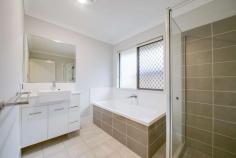21B Grange Road Newtown QLD 4305 $419,000+ This fully turn-key brand new home is in an unbeatable location and has been tastefully designed, showcasing modern finishes throughout and a contemporary open plan footprint. The home features a premium kitchen, dazzling bathrooms, plenty of space in every room and a master suite fit for a king. This is the one you've been waiting for! Don't miss out. Property Details: - All bedrooms are carpeted and feature roller blinds, a ceiling fan and built-in wardrobes - Main bedroom also features air-conditioning, contemporary ensuite, plus a large walk-in wardrobe - Spacious, air-conditioned open plan living, kitchen and dining area; ceiling fan above the lounge area - Huge galley style kitchen with large island bench and breakfast bar, plenty of counter and cupboard space; very modern/stylish design and finishes; Caesarstone benchtops; extra-large fridge space - Kitchen appliances include an electric stove top, oven, grill, built-in microwave, retractable range hood and dishwasher - all stainless steel; existing provision for fridge water connection - Well-appointed main bathroom with bath, shower and combined ceiling extractor/heater - Internal laundry with easy access to washing line - Undercover outdoor entertainment area/patio directly accessible from the main living area of the home - Double lockup garage with remote control and internal access + side access - Modern recessed light fittings throughout the entirety of the home - New fencing - Security screens - 5.5KW solar system + additional solar hot water Move in ready - nothing more to do! Don't miss your chance to purchase this spectacular home, come and inspect the property today. Please contact the agent to arrange your inspection: