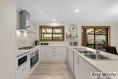 34 Gateacre Brow Onkaparinga Hills SA 5163 $515,000-$545,000 Beautifully presented inside & out this impressive family home with 4 bedrooms, 2 bathrooms, 2 living areas + study is situated on a huge 921sqm allotment in the gorgeous leafy location of Onkaparinga Hills. Offering plenty of off road vehicle parking, excellent rear yard access with double roller doors and a double gate, a triple width carport plus a double garage; this home will suit those with an active lifestyle, a tradesperson or collector of toys! Built in 1993 with progressive updates this spacious home looks & feels great. Room sizes are incredibly generous with many large windows to allow the natural light in. At the heart of the home is the modern open plan kitchen/family/dine that enjoys two private outlooks; shaded fernery on one side or pitched roof entertaining area accessed by glass sliding door on the other. This central space is a modern comfortable area where family can gather and then easily retreat for privacy when the need arises. The front of the home is host to the Living Room, Study, Bedroom 2 & the Master Bedroom with WIR & recently renovated Ensuite. The Master Bedroom also offers glass sliding door access to the shaded fernery that doubles for privacy and a very pleasant outlook. Bedrooms 3 & 4 are located to the rear of the home with large windows to overlook the manicured back yard and are serviced by the 3 way Family Bathroom. Features of the home include: • Ducted evaporative air conditioning • Gas heating • Additional r/c split system • Modern floorboards to the traffic areas • Plush carpet in all 4 bedrooms • Large Laundry • Excellent outdoor entertaining area • Triple Carport • Double Garage This home has been loved & maintained yet the time has come to move on so be quick and take advantage of this opportunity to join a well established, quiet neighbourhood. For further information on this great property or to enquire on inspection times, call Deb Sorensen from Ray White Port Noarlunga on 0408 316 011. Proudly Presented by:- Ray White Port Noarlunga 2/32 Saltfleet Street, Port Noarlunga 5167 Ph: 08 8382 0029 Fax: 08 8326 1034 www.raywhiteportnoarlunga.com.au RLA 250556..