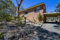 12 Railway Parade Tallong NSW 2579 $549,000 DUE TO COVID-19 RESTRICTIONS ALL INSPECTIONS ARE BY APPOINTMENT ONLY Set in an elevated location offering distant bush views and great proximity to the village shop, school and station. The solid brick home offers a generous mud room to entry foyer and open plan living with large windows for light and to maximise your views over the garden and abundant birdlife. The newly renovated kitchen is the hub of the home and services the living/dining space seamlessly. Pressed metal splash back, wood fire stove + free standing gas cooktop/oven The home offers 9 foot ceilings, split a/c + gas points + Hydronic heating Plenty of water storage totalling close to 100,000 litres + septic for waste Solar + battery backup, dual wired, enabling usage in blackouts and use of batteries instead of mains power within the home Master suite is generous in size with large walk through robe and ensuite Remaining 2 bedrooms also sizeable and serviced by a family bathroom + internal laundry Under home offers workshop + double tandem carport, there is a free standing single garage with carport + various outbuildings for storage and entertaining gazebo The rear deck offers added entertaining space and looks over the yard and selection of fruit trees beyond including berries, cherries, apricots, quince etc. Optional extras include the block being on two titles with the ability to sub-divide or just enjoy the space from neighbouring properties. Fencing is in place and the grounds are low maintenance. Call today to book your private viewing.
