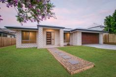 21B Grange Road Newtown QLD 4305 $419,000+ This fully turn-key brand new home is in an unbeatable location and has been tastefully designed, showcasing modern finishes throughout and a contemporary open plan footprint. The home features a premium kitchen, dazzling bathrooms, plenty of space in every room and a master suite fit for a king. This is the one you've been waiting for! Don't miss out. Property Details: - All bedrooms are carpeted and feature roller blinds, a ceiling fan and built-in wardrobes - Main bedroom also features air-conditioning, contemporary ensuite, plus a large walk-in wardrobe - Spacious, air-conditioned open plan living, kitchen and dining area; ceiling fan above the lounge area - Huge galley style kitchen with large island bench and breakfast bar, plenty of counter and cupboard space; very modern/stylish design and finishes; Caesarstone benchtops; extra-large fridge space - Kitchen appliances include an electric stove top, oven, grill, built-in microwave, retractable range hood and dishwasher - all stainless steel; existing provision for fridge water connection - Well-appointed main bathroom with bath, shower and combined ceiling extractor/heater - Internal laundry with easy access to washing line - Undercover outdoor entertainment area/patio directly accessible from the main living area of the home - Double lockup garage with remote control and internal access + side access - Modern recessed light fittings throughout the entirety of the home - New fencing - Security screens - 5.5KW solar system + additional solar hot water Move in ready - nothing more to do! Don't miss your chance to purchase this spectacular home, come and inspect the property today. Please contact the agent to arrange your inspection: