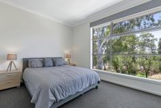 1 SANDRA AVENUE TEA TREE GULLY SA 5091 $709,000-$749,000 Built in 2019 with grand design and proportions this 350 sqm residence is suitable to accommodate a growing family in contemporary comfort and style. This two storey four bedroom residence sits proudly on the high side of a tree lined street on a traditional 573 sqm allotment providing elevated creek and urban views. The design accommodates the main bedroom on the lower level with the other 3 bedrooms and study located on the upper floor. There's a dedicated living room per level providing plenty of internal living space to accommodate a family with children of all ages. In addition the alfresco and balcony provide a choice of outdoor options to entertain, barbecue or sit back, relax and enjoy the creek views and summer breezes. Surrounded by a mix of quality established homes and new construction in a popular foothills location within walking distance to public transport, schools, cafes, St Agnes Shopping Centre and a 5 minute drive or bus ride to Tea Tree Plaza and the O-Bahn interchange. Additionally for those with a passion for the outdoors, the scenic Anstey Hill Recreation Park and Angove Park Conservation reserve are in the immediate area providing a well balanced lifestyle location for all to enjoy. It's time to treat the family to a substantial home ready to provide comfort and space for all to enjoy for years to come. Features: -Total dwelling size of 353 sqm (approximate) -4 double bedrooms + separate office/study -2 separate living areas includes lower level open plan living & meals with direct access to the Alfresco + a large upper level carpeted family room with direct access to the balcony -Well equipped kitchen with stone bench-tops, butler's pantry, 900 wide oven & 5-burner gas stove -Main bedroom with walk thru robe and deluxe ensuite -Cleverly designed main bathroom -3rd toilet / powder room located on the lower level -Reverse cycle ducted air conditioning -2.7 metre high ceilings -Study/office with built-in furniture -LED energy efficient lighting -Quality fixtures and fittings -Abundance of storage -Tiled alfresco -Tiled balcony with automated cafe blinds -Double garage with internal access + remote automated panel lift door -Secure off-street parking available -Fully fenced 573sqm allotment Year built: 2019 (Construction completed November 2019) Land size: 573 sqm (approximate) Dwelling size: 353 sqm (approximate) Council: City of Tea Tree Gully Council rates: Matthew Lee MichaelKris Real Estate RLA 212749..