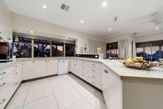 5/95 Crisp Circuit Bruce ACT 2617 Peacefully positioned in an exclusive dress-circle location backing Gossan Hill Nature Reserve and capturing magnificent panoramic views across the Belconnen Valley, Lake Ginninderra and Brindabella Mountain Ranges is this impeccably presented four bedroom family residence. Located within Bruce's most prestigious boutique complex the "Somers" is this inspirational freestanding, split level townhouse that sprawls across an expansive north-west facing block. The development was privately built by award winning builders the Rosin Bros, and with no expense spared the home showcases quality craftsmanship. The current owner has resided in this impressive home for nearly 30 years, and during this time has enjoyed its unique design, enviable location and has proudly maintained the home and grounds to the highest of standards. This architecturally designed retreat is brilliant for busy professionals or as a wonderful family home, particularly for those who love to entertain. Located on the entrance level are four spacious bedrooms, main bathroom including a luxuriously proportioned, and segregated master which boasts magnificent garden views, a bank of wardrobes along one side of the room and sparkling ensuite with spa bath and dual sinks. The fourth bedroom has been brilliantly set up as a study/home office with its quality custom built workstation. The split level design offers formal living and dining rooms which flow through to an open plan family room, meals area and impressive gourmet kitchen - the chef of the home will love the sublime cooking space. Bathed in natural light and with captivating views is the sunroom extension which is the ideal setting for year round family get-togethers or a peaceful setting where you can relax and unwind while reading the Sunday paper. The established gardens are magnificent with the Japanese influenced design displaying colours that compliment Canberra's four seasons. The gardens are designed to provide shade in the summer months, keeping the home to a cool temperature. Special features include: * tranquil and elevated position backing Gossan Hill Nature Reserve * tightly held boutique complex of seven owner occupied homes * magnificent views * freestanding split level, four bedroom townhouse * welcoming front entrance overlooking an atrium * formal open plan dining and living room with 2.7m ceilings and slow combustion fireplace * master bedroom with custom designed wardrobes * ensuite with floor to ceiling tiles, spa bath, separate shower and dual sinks * four segregated living areas * north facing sunroom extension with Sydney Blue Gum flooring, RC/AC, luxaflex blinds to all windows and external access to the timber deck and gardens * gourmet kitchen with 20mm Caesarstone bench tops, glass splashback, soft closing drawers, * Miele stainless steel pyroletic oven, induction ceramic cooktop, microwave/convection oven, dishwasher, walk in pantry, and generous storage with custom built cabinetry * open plan meals and family room with LED lighting * ducted gas heating and ducted air conditioning throughout * bedrooms two, and three are generous in size; both with built in robes * bedroom four/study - featuring quality built-in cabinetry * sparkling main bathroom plus separate toilet and powder room * as new carpet * security flyscreens to some rooms * private north facing timber deck * spacious laundry with ample storage * abundant storage throughout * spacious brick double garage with auto door * garage roof storage with loft ladder access * new steel gutter guards * 2,500 ltr water tank with pump * instant gas hot water * eight solar panels - fed back to the grid * alarm system * magnificent gardens with irrigation and rock retaining walls Living - 261.90sqm Garage - 46.40sqm Total - 308.30sqm B/C fees - $5,163.12 pa Rates - $3,164.35 pa With the top end of Bruce one of Canberra's most unique and sought after communities, you will fall in love with the unbeatable location with the rear boundary accessing hectares of natural bushland. The location is outstanding providing an easy walk through reserve to the University of Canberra and Radford College for students. On your doorstep is the AIS, three major hospitals, with the ANU and City Centre only 6 minutes away. Westfield Belconnen and the popular Jamison Plaza are close by for your convenience. ** PLEASE NOTE this property will go to auction on Thursday, 18th June at 6:00pm. To register and watch the live stream please go to www.raywhitecanberra.com.au/watch-our-auctions-live. Please call Phyllis directly to discuss further. ** FEATURES: • Air Conditioning • Built-In Wardrobes • Close To Schools • Close To Shops • Close To Transport • Fireplace(S)..