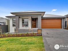15 INSLEY STREET GOOGONG NSW 2620 Located in an established street and within walking distance to the Googong pool and entertainment hub you will find this stunning 3 bedroom ensuite family home with a large north facing open plan design. As you enter the home you will admire the quality finishes and fixtures. At the front of the home is the master bedroom with walk-in robe and ensuite Down the hall you are led into the large open plan kitchen, family and meals area. The kitchen boasts stunning stone bench tops and back splash, a large island, walk-in pantry and striking black appliances. The open plan living area opens out to the covered alfresco dining space with a feature built-in barbecue, offering a sink and stone benches. Both remaining bedrooms have built-in robes. There is a 3-way style bathroom and separate laundry with additional storage. The double garage offers a storage area, remote control and internal access along with rear yard access. Features: – Large north facing open plan design – Main bedroom with walk-in robe and ensuite – Remaining bedrooms with built-in robes – Stunning kitchen with walk-in pantry – Covered alfresco area with built-in BBQ area – Ducted reverse cycle air conditioning – Alarm system – Double garage with internal access – Great location walking distance to Googong facilities PROPERTY FEATURES • House • 3 bed • 2 bath • 2 Parking Spaces • Alarm System • 2 Garage • Remote Garage • Dishwasher • Built In Robes • Outdoor Entertaining..