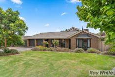 34 Gateacre Brow Onkaparinga Hills SA 5163 $515,000-$545,000 Beautifully presented inside & out this impressive family home with 4 bedrooms, 2 bathrooms, 2 living areas + study is situated on a huge 921sqm allotment in the gorgeous leafy location of Onkaparinga Hills. Offering plenty of off road vehicle parking, excellent rear yard access with double roller doors and a double gate, a triple width carport plus a double garage; this home will suit those with an active lifestyle, a tradesperson or collector of toys! Built in 1993 with progressive updates this spacious home looks & feels great. Room sizes are incredibly generous with many large windows to allow the natural light in. At the heart of the home is the modern open plan kitchen/family/dine that enjoys two private outlooks; shaded fernery on one side or pitched roof entertaining area accessed by glass sliding door on the other. This central space is a modern comfortable area where family can gather and then easily retreat for privacy when the need arises. The front of the home is host to the Living Room, Study, Bedroom 2 & the Master Bedroom with WIR & recently renovated Ensuite. The Master Bedroom also offers glass sliding door access to the shaded fernery that doubles for privacy and a very pleasant outlook. Bedrooms 3 & 4 are located to the rear of the home with large windows to overlook the manicured back yard and are serviced by the 3 way Family Bathroom. Features of the home include: • Ducted evaporative air conditioning • Gas heating • Additional r/c split system • Modern floorboards to the traffic areas • Plush carpet in all 4 bedrooms • Large Laundry • Excellent outdoor entertaining area • Triple Carport • Double Garage This home has been loved & maintained yet the time has come to move on so be quick and take advantage of this opportunity to join a well established, quiet neighbourhood. For further information on this great property or to enquire on inspection times, call Deb Sorensen from Ray White Port Noarlunga on 0408 316 011. Proudly Presented by:- Ray White Port Noarlunga 2/32 Saltfleet Street, Port Noarlunga 5167 Ph: 08 8382 0029 Fax: 08 8326 1034 www.raywhiteportnoarlunga.com.au RLA 250556..