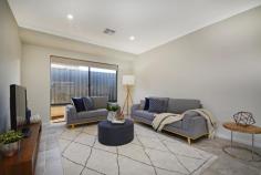 37 Aventurine Road Treeby WA 6164 $485,000 First-home buyers and young families alike will be eager to take full advantage of this quality brand-new Dale Alcock Projects built 3 bedroom 2 bathroom Green-Title home in the outstanding “Calleya Estate” where modern low-maintenance living meets an ultra-convenient location like no other. The State government has committed to building a new school in the estate that is estimated for completion by 2022, allowing you and your loved ones to enjoy a desirable lifestyle within a short drive of boutique shopping at Gateway Shopping City, as well as gorgeous walkways and biking trails nearby. A close proximity to local schools (including the Atwell Primary School and Atwell College catchment zones), Murdoch University, the Fiona Stanley Hospital, Cockburn Central Train Station, the freeway and a short 25-minute drive to our vibrant Perth CBD is simply just an added bonus here. Beyond lush green front lawns lies the house itself where a light, bright and beautifully-tiled open-plan family, dining and kitchen area doubles as a spacious central hub – sparkling stone bench tops, breakfast bar for casual meals, Artusi appliances and more. Like the bedrooms, an intimate theatre room is also carpeted for complete comfort, whilst the outdoor alfresco-entertaining area within the backyard is brilliant in its privacy. Why build when all of the hard work has already been done for you here? Just bring your belongings and move straight on in! WHAT’S INSIDE: • Gross Build Area (Under Roof) – 194sqm (approx.) • 3 bedrooms, 2 bathrooms – plus an E-Zone study nook • Huge open-plan living/dining/kitchen area with a double pantry, alfresco access, stone bench tops, stylish light fittings, a breakfast bar, double sinks, tiled splashbacks, a dishwasher recess, Artusi five-burner gas-cooktop and oven appliances and a stainless-steel range hood • Carpeted home office and bedrooms • Front master suite with a walk-in wardrobe and a sleek ensuite bathroom comprising of twin stone vanities, a shower and a separate toilet • 2nd/3rd bedrooms with full-height mirrored built-in robes • Stylish main family bathroom with a bathtub, a separate shower and a stone vanity • Tiled laundry with a full-height double mirrored linen/broom cupboard, a stone bench top and outdoor access to the side drying courtyard • Separate 2nd toilet • Linen press WHAT’S OUTSIDE: • Land area: 313sqm (approx.) • Rear alfresco-entertaining area off the family room, complete with outdoor power points, lush green lawn and a private backyard setting • Remote-controlled double lock-up garage with internal shopper’s entry and power and data points already connected • Neatly-tended front lawns EXTRAS: • Build by Dale Alcock Projects • High ceilings to passage, living areas, master bedroom and alfresco • Ducted and zoned reverse-cycle air-conditioning • Quality modern blind fittings throughout • Feature down lighting • Feature skirting boards • Instantaneous gas hot-water system • Colorbond fencing • Reticulated easy-care gardens • Side access LOCATION: • 25-minute drive from Perth CBD • Close to the freeway, shopping and public transport at Cockburn Central (just four stops to the city) • Walk to a plethora of local parklands with playgrounds, plus the Calleya Junior BMX Park around the corner • Local café and Nido Early School for children now up and running within estate..