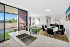38/70 Hills Street North Gosford NSW 2250 Centrally located in the ever developing and popular North Gosford precinct, a short stroll to Gosford Station, CBD and North Gosford Private & Public Hospitals. This oversized, 2 bed, 2 bath + Study apartment has all rooms opening up onto a large North Facing entertainers terrace. Boasting high ceilings and double secure parking, this stunning apartment will go quickly. • Elevated North facing location. • 2 bedrooms, 2 bathrooms & study. • Master bedroom with en-suite and direct balcony access. • 2.7m high ceilings with crown moulding and floor to ceiling tinted sliding doors with roller blinds and fly screens. • Internal size 86sqm, terrace size 53sqm, garage 27sqm. • Double secure car parking and storage cage. • Full CCTV security and video intercom. • Fast and reliable dual lift access. • Air-conditioning to living areas and ceiling fans in both bedrooms. • Luxury hardwood flooring throughout. • Stone benchtops with peninsula and stone splash-back, natural gas cooktop, electric oven & dishwasher. • Polyurethane soft close cupboards in kitchen and both bathrooms. • Freestanding bathtub, feature wall and floor to ceiling tiling in both bathrooms. • European laundry with built in dryer and stainless-steel sink and tapware. • Outdoor blinds extend the covered living area another 12sqm • Both bedrooms and living areas open out onto a 53sqm entertainer’s terrace with seamless outdoor indoor living. • Expansive communal rooftop terrace with BBQ facilities and water views. • Bus stop at your doorstep. This meticulously maintained 2 year old apartment must be seen to be appreciated…
