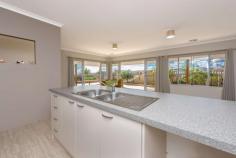 2 Poseidon Way Glenfield WA 6532 $443,000 This charming home is so well located with the beach being less than 200 metres the park 50 metres and the bus stop even closer at 20 metres 2 Poseidon Way has been tastefully decorated in beachy colours and boasts a large open plan kitchen, great flow from dining out to alfresco with plenty of seating and easy care gardens with fruit trees, and expansive sea views to the northwest. It's north facing aspect means you will get the full benefit of warming winter sun. The bedrooms are a generous size size, all carpeted and all with 12kw ducted air-conditioning. There is even the added bonus of a study nook off the kitchen with lots of room to spread out. There is plenty of room in the garage to store the man toys, and it has access to the back yard. Another very welcome feature is an outside shower, so you can wash off the kids and the dog after that refreshing ocean swim! Please call Janette Brennan on 0417 091 665 to view this amazing property. Property Features: • 580sqm block • Easy care raised garden beds • Constructed early 2014 • Access to back yard through garage • 3.1m high ceilings • Large corner pantry • excellent window treatments • 4 stn Auto reticulation system • Water rates: (for period 01/07/2019 to 30/06/2020) - $1,463.15 • Council rates: $2,650.00 FEATURES: • Air Conditioning • Built-In Wardrobes • Close To Schools • Close To Shops • Close To Transport • Garden..