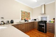 986 Wewak Street North Albury NSW 2640 $299,000 An opportunity has arisen for the savvy investor or astute owner occupier to secure a spacious family home on a secure 670 m sq allotment close to the CBD of Albury and Lavington. Situated in a quiet street with a school positioned three doors up there has never been a better time to enter the market and secure this property. - High ceilings, polished timber floors and a spacious layout adorns this sturdy brick home - Four generous carpeted bedrooms. Two rooms feature built in robes. - A modern kitchen is highlighted with stone bench tops, upright gas stove and rangehood - Light and airy formal and informal living areas are complimented by large picture windows - Separate shower and bath rooms feature two hand basins & there is a separate toilet. - Gas heating, ducted evaporative cooling and a ceiling fan maintain the home comfortably - Currently leased at $310 per week on a month to month basis - Council rates approx.$1224.13/yr, Water rates approx.$852.45/yr plus consumption..