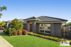 3 Halloway Boulevard North Kellyville NSW 2155 $1,150,000 Displaying a total commitment to modern family living, this stunning 5 year old single level Alkira designed home perfectly blends modern design cues and quality inclusions with a carefree low maintenance lifestyle set on a level 450 sqm block. Features include: - Wide entry foyer introducing large format porcelain tiles. - Spacious, contemporary kitchen, quality finished with stone bench tops and featuring a 900mm free standing oven with gas cooktop, canopy range hood, dishwasher and walk-in pantry. - The generous island bench with over mount sinks overlooks the adjacent dining space and casual living zone. - Carpeted home theatre with surround sound, ideal for family movie nights. - Master bedroom with walk-in robe and a wonderful ensuite. - Three additional queen sized bedrooms with built in robes plus an open plan media room. - Elegant main bathroom finished in neutral tones with bathtub and a separate powder room for guests. - Delightful tiled alfresco entertaining area with down lights and ceiling fan overlooking the low maintenance backyard. - Second timber deck - Double auto garage with internal access. - Creature comforts include two zone ducted air, gas outlets inside and out, down lights, blinds and remote alarm. This practical yet flowing floor plan will suit families as well as downsizers who don't want to compromise on quality. The location is superb, being walking distance to sought after amenities including the North Kellyville Primary School and moments to local shopping and an array of parklands and sporting fields. For more information contact Wayne Gay on 0403 052 226 to Tracey Paterson 0406 754 462..