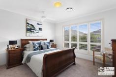 3 Halloway Boulevard North Kellyville NSW 2155 $1,150,000 Displaying a total commitment to modern family living, this stunning 5 year old single level Alkira designed home perfectly blends modern design cues and quality inclusions with a carefree low maintenance lifestyle set on a level 450 sqm block. Features include: - Wide entry foyer introducing large format porcelain tiles. - Spacious, contemporary kitchen, quality finished with stone bench tops and featuring a 900mm free standing oven with gas cooktop, canopy range hood, dishwasher and walk-in pantry. - The generous island bench with over mount sinks overlooks the adjacent dining space and casual living zone. - Carpeted home theatre with surround sound, ideal for family movie nights. - Master bedroom with walk-in robe and a wonderful ensuite. - Three additional queen sized bedrooms with built in robes plus an open plan media room. - Elegant main bathroom finished in neutral tones with bathtub and a separate powder room for guests. - Delightful tiled alfresco entertaining area with down lights and ceiling fan overlooking the low maintenance backyard. - Second timber deck - Double auto garage with internal access. - Creature comforts include two zone ducted air, gas outlets inside and out, down lights, blinds and remote alarm. This practical yet flowing floor plan will suit families as well as downsizers who don't want to compromise on quality. The location is superb, being walking distance to sought after amenities including the North Kellyville Primary School and moments to local shopping and an array of parklands and sporting fields. For more information contact Wayne Gay on 0403 052 226 to Tracey Paterson 0406 754 462..