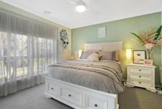 13 Lutzen Close Baranduda VIC 3691 $439,000 Located in stunning Baranduda, this Peter Bowen built home is sure to impress the entire family. Situated on a rare block of approx. 1222m2, room is abundant for the growing family and any shedding required. Comprising of four generous bedrooms complete with built-in storage and ceiling fans, the master is finished with a spacious ensuite. A free-flowing floorplan features multiple living zones ensuring the family enjoys their own space. A separate lounge to the front is an intimate setting ideal for movie nights, while the additional living area off the kitchen/dining zone enjoys beautiful views of the backyard. The well-appointed kitchen is sure to inspire the cooks in the family with generous storage for all the necessary tools of the trade. Adjacent to the kitchen/dining area, the large alfresco looks out to the huge backyard with plenty of room for the kids or family pets to enjoy. Meticulously landscaped with low maintenance plants, the rear yard is the perfect space to enjoy a fire with family and friends or a good book. The entrenched lemon, mango, and kaffir lime trees, along with the large chicken coop allow you to cook with organic food right from your backyard. A large double lock up garage is complete with gates providing rear yard access. Other notable features include evaporative cooling and recently installed ducted heating along with additional veggie patches, completing this impressive family package. Located within walking distance to local schools, a busy corner store and sporting grounds, properties like this are often sought but seldom found. Call today!!!
