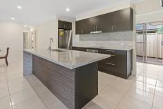 8 Earls Ct Goonellabah NSW 2480 $625,000 Set on a 1026m2 elevated parcel of land capturing lovely summer breezes, this newly completed home (less than 12 months ago) is a genuine move in ready opportunity & sure to impress with all the hard work done. Landscaped gardens & lawns with a large level area for that in ground pool – if this is what you want. Oh and extra space for the veggie garden. In a quiet estate & on a cul-de-sac, this just completed home is ready for the lucky buyer to move straight, unpack your bags and start living the Northern Rivers dream. Offering a home office or study upon entering with the master bedroom walk in robe & ensuite & both the 2 other bedrooms all to the rear – giving the ideal separation for a home business without interrupting the family, Hey foodies this kitchen is a central feature of this lovely home with a butlers pantry tucked to the rear! Open living flows out to an undercover, entertaining patio to the north provides the perfect aspect. On the front south/west side is the double lock up garage with level internal access, auto remote controls and space for storage of the golf clubs, bikes etc. With a beautiful leafy outlook & only a stone’s throw to the gated dog walk reserve and sporting fields, and a shopping withing a 5 min drive - this property will appeal to young families or retirees with extended families – to enjoy all year round. Do not delay this property has been priced to sell quickly!!!
