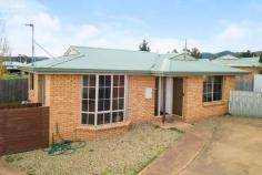 4/3 Horsham Road Oakdowns TAS 7019 $335,000 This neat two bedroom villa is well featured throughout and is one of six at this sort-after address. The property has received excellent improvements over the time of the current ownership by way of a renovated kitchen and bathroom, internal repaint and carpet, the addition of a paved car space providing OSP for two and a covered outdoor entertaining patio. These upgrades have elevated this villa beyond its original design, making it a standout in comparison. This residence offers good size rooms, quality updates, a free flowing floor plan and a good outdoor area, all set on a level allotment that is conveniently located to all services which makes this property an attractive proposition for investment to add to your portfolio or for live-in purposes. If you are looking for a sound investment, this one is for you. FEATURES: • Air Conditioning • Built-In Wardrobes • Close To Schools • Close To Shops • Close To Transport • Updated Kitchen And Bathroom..