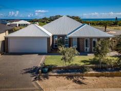 2 Poseidon Way Glenfield WA 6532 $443,000 This charming home is so well located with the beach being less than 200 metres the park 50 metres and the bus stop even closer at 20 metres 2 Poseidon Way has been tastefully decorated in beachy colours and boasts a large open plan kitchen, great flow from dining out to alfresco with plenty of seating and easy care gardens with fruit trees, and expansive sea views to the northwest. It's north facing aspect means you will get the full benefit of warming winter sun. The bedrooms are a generous size size, all carpeted and all with 12kw ducted air-conditioning. There is even the added bonus of a study nook off the kitchen with lots of room to spread out. There is plenty of room in the garage to store the man toys, and it has access to the back yard. Another very welcome feature is an outside shower, so you can wash off the kids and the dog after that refreshing ocean swim! Please call Janette Brennan on 0417 091 665 to view this amazing property. Property Features: • 580sqm block • Easy care raised garden beds • Constructed early 2014 • Access to back yard through garage • 3.1m high ceilings • Large corner pantry • excellent window treatments • 4 stn Auto reticulation system • Water rates: (for period 01/07/2019 to 30/06/2020) - $1,463.15 • Council rates: $2,650.00 FEATURES: • Air Conditioning • Built-In Wardrobes • Close To Schools • Close To Shops • Close To Transport • Garden..