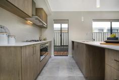 37 Aventurine Road Treeby WA 6164 $485,000 First-home buyers and young families alike will be eager to take full advantage of this quality brand-new Dale Alcock Projects built 3 bedroom 2 bathroom Green-Title home in the outstanding “Calleya Estate” where modern low-maintenance living meets an ultra-convenient location like no other. The State government has committed to building a new school in the estate that is estimated for completion by 2022, allowing you and your loved ones to enjoy a desirable lifestyle within a short drive of boutique shopping at Gateway Shopping City, as well as gorgeous walkways and biking trails nearby. A close proximity to local schools (including the Atwell Primary School and Atwell College catchment zones), Murdoch University, the Fiona Stanley Hospital, Cockburn Central Train Station, the freeway and a short 25-minute drive to our vibrant Perth CBD is simply just an added bonus here. Beyond lush green front lawns lies the house itself where a light, bright and beautifully-tiled open-plan family, dining and kitchen area doubles as a spacious central hub – sparkling stone bench tops, breakfast bar for casual meals, Artusi appliances and more. Like the bedrooms, an intimate theatre room is also carpeted for complete comfort, whilst the outdoor alfresco-entertaining area within the backyard is brilliant in its privacy. Why build when all of the hard work has already been done for you here? Just bring your belongings and move straight on in! WHAT’S INSIDE: • Gross Build Area (Under Roof) – 194sqm (approx.) • 3 bedrooms, 2 bathrooms – plus an E-Zone study nook • Huge open-plan living/dining/kitchen area with a double pantry, alfresco access, stone bench tops, stylish light fittings, a breakfast bar, double sinks, tiled splashbacks, a dishwasher recess, Artusi five-burner gas-cooktop and oven appliances and a stainless-steel range hood • Carpeted home office and bedrooms • Front master suite with a walk-in wardrobe and a sleek ensuite bathroom comprising of twin stone vanities, a shower and a separate toilet • 2nd/3rd bedrooms with full-height mirrored built-in robes • Stylish main family bathroom with a bathtub, a separate shower and a stone vanity • Tiled laundry with a full-height double mirrored linen/broom cupboard, a stone bench top and outdoor access to the side drying courtyard • Separate 2nd toilet • Linen press WHAT’S OUTSIDE: • Land area: 313sqm (approx.) • Rear alfresco-entertaining area off the family room, complete with outdoor power points, lush green lawn and a private backyard setting • Remote-controlled double lock-up garage with internal shopper’s entry and power and data points already connected • Neatly-tended front lawns EXTRAS: • Build by Dale Alcock Projects • High ceilings to passage, living areas, master bedroom and alfresco • Ducted and zoned reverse-cycle air-conditioning • Quality modern blind fittings throughout • Feature down lighting • Feature skirting boards • Instantaneous gas hot-water system • Colorbond fencing • Reticulated easy-care gardens • Side access LOCATION: • 25-minute drive from Perth CBD • Close to the freeway, shopping and public transport at Cockburn Central (just four stops to the city) • Walk to a plethora of local parklands with playgrounds, plus the Calleya Junior BMX Park around the corner • Local café and Nido Early School for children now up and running within estate..