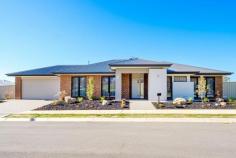 32 Stableford Rd Glenroy NSW 2640 $485,000 * A brand new brick veneer home of luxurious, stylish, and modern design, ready for you to move into and enjoy, set on a manageable 624 sqm block. * Offering a formal lounge, open plan family/dining area, a designer kitchen with walk-in pantry, gas cooking centre including dishwasher and built-in microwave, tiled floors, and ample cupboard space. * 3 generous bedrooms each with built-in-robes with the master having a walk-through-robe and ensuite, and offering ducted heating and cooling throughout. * There are also fully landscaped gardens, an undercover rear entertainment area plus secure fencing and a rainwater tank and sprinkler system. * Double garage with remote that provides internal access to the house and a secure yard with sufficient extra space to accommodate a caravan, a boat or a shed. * Government benefits available on new home purchases and for first home buyers (STA). This brand new property offers comfortable and easy modern living at every turn, close to all amenities, school, shops, and sports grounds and only minutes’ drive to Albury CBD Take advantage of this opportunity to secure a new property with all the latest modern luxury features. When you combine comfort, style, quality, and location you get perfection!