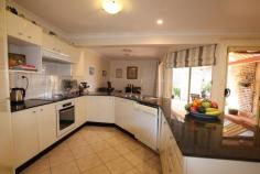 9 Richard St Mittagong NSW 2575 $785,000 A VERY APPEALING BRICK AND TILE HOME OF GENEROUS PROPORTIONS AND QUALITY INCLUSIONS IT HAS BEEN METICULOUSLY CARED FOR AND IS BEAUTIFULLY PRESENTED THROUGHOUT * Tiled entry * Formal lounge and dining (combined) * Stylish kitchen with granite benchtops, electric oven and cooktop, gas connection, rangehood, dishwasher and breakfast bar * Casual meals area with wood fire and sliding door to covered outdoor entertaining area * Sunny family room with bay windows and views to Mt Alexandra * Ducted reverse-cycle air conditioning (zoned) * Gas bayonets in lounge, garage and alfresco area for the bar-b-q * Study area * Four generous bedrooms * Built-in robes (walk-in robe in main) * 2 bathrooms (ensuite to bed 1) * Laundry with door to outside * External retractable canvas blinds on windows * Double garage with auto door and internal access * Landsize: 776m2 SET ON A PRETTY, ESTABLISHED BLOCK FEATURING ROSES, CAMELIAS, SPECIMEN TREES AND A LEMON TREE FOR 'HAPPY HOUR"! IT IS SITUATED IN A QUIET, SUNNY LOCATION AND IS WITHIN WALKING DISTANCE TO THE MITTAGONG MARKET PLACE..