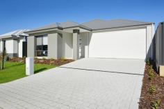 37 Aventurine Road Treeby WA 6164 $485,000 First-home buyers and young families alike will be eager to take full advantage of this quality brand-new Dale Alcock Projects built 3 bedroom 2 bathroom Green-Title home in the outstanding “Calleya Estate” where modern low-maintenance living meets an ultra-convenient location like no other. The State government has committed to building a new school in the estate that is estimated for completion by 2022, allowing you and your loved ones to enjoy a desirable lifestyle within a short drive of boutique shopping at Gateway Shopping City, as well as gorgeous walkways and biking trails nearby. A close proximity to local schools (including the Atwell Primary School and Atwell College catchment zones), Murdoch University, the Fiona Stanley Hospital, Cockburn Central Train Station, the freeway and a short 25-minute drive to our vibrant Perth CBD is simply just an added bonus here. Beyond lush green front lawns lies the house itself where a light, bright and beautifully-tiled open-plan family, dining and kitchen area doubles as a spacious central hub – sparkling stone bench tops, breakfast bar for casual meals, Artusi appliances and more. Like the bedrooms, an intimate theatre room is also carpeted for complete comfort, whilst the outdoor alfresco-entertaining area within the backyard is brilliant in its privacy. Why build when all of the hard work has already been done for you here? Just bring your belongings and move straight on in! WHAT’S INSIDE: • Gross Build Area (Under Roof) – 194sqm (approx.) • 3 bedrooms, 2 bathrooms – plus an E-Zone study nook • Huge open-plan living/dining/kitchen area with a double pantry, alfresco access, stone bench tops, stylish light fittings, a breakfast bar, double sinks, tiled splashbacks, a dishwasher recess, Artusi five-burner gas-cooktop and oven appliances and a stainless-steel range hood • Carpeted home office and bedrooms • Front master suite with a walk-in wardrobe and a sleek ensuite bathroom comprising of twin stone vanities, a shower and a separate toilet • 2nd/3rd bedrooms with full-height mirrored built-in robes • Stylish main family bathroom with a bathtub, a separate shower and a stone vanity • Tiled laundry with a full-height double mirrored linen/broom cupboard, a stone bench top and outdoor access to the side drying courtyard • Separate 2nd toilet • Linen press WHAT’S OUTSIDE: • Land area: 313sqm (approx.) • Rear alfresco-entertaining area off the family room, complete with outdoor power points, lush green lawn and a private backyard setting • Remote-controlled double lock-up garage with internal shopper’s entry and power and data points already connected • Neatly-tended front lawns EXTRAS: • Build by Dale Alcock Projects • High ceilings to passage, living areas, master bedroom and alfresco • Ducted and zoned reverse-cycle air-conditioning • Quality modern blind fittings throughout • Feature down lighting • Feature skirting boards • Instantaneous gas hot-water system • Colorbond fencing • Reticulated easy-care gardens • Side access LOCATION: • 25-minute drive from Perth CBD • Close to the freeway, shopping and public transport at Cockburn Central (just four stops to the city) • Walk to a plethora of local parklands with playgrounds, plus the Calleya Junior BMX Park around the corner • Local café and Nido Early School for children now up and running within estate..