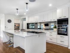 55B High St Barnawartha VIC 3688 $529,000 Situated in a private and secure location in the township of Barnawartha, 20 mins (24kms) to the Wodonga CBD via the Hume freeway and easy commute to other surrounding popular townships. (Yackandandah 30kms, Beechworth 37kms, Rutherglen 25kms) Residence: Upon entry this 12-month-old quality built "Hadar" home will immediately impress, with its clever floor plan and stylish modern décor. Comprising of four (4) bedrooms the master boasting a full ensuite with double vanity and a walk-in robe. Two of the three remaining bedrooms also offer walk in robes, and a large built in services the last bedroom. A ‘light and bright’ open plan design incorporates kitchen, dining, and lounge spaces with an additional sitting room. The beautiful kitchen is at the heart of the home and features an abundance of cupboard/draw space, island bench, ‘omega’ electric appliances, and a walk-in pantry. A full family bathroom with separate toilet and a large well-equipped laundry complete the inside of this magnificent home. Other features include: - Reverse cycle air conditioning/heating. - Overhead fans to all bedrooms. - Shutter blinds. - Quality fixtures and fittings throughout. - Plenty of natural light. - Double garage with remote entry. Gardens and Surrounds: The 1164m2 (approx.) picturesque allotment consists of established landscaped gardens, all weather outdoor alfresco dining/entertaining area. 6.6kw solar power system, and a 6m x 5m shed perfect for the home handyman or tradesman, with two (2) roller doors, concrete floor and power. Agents Remarks: An opportunity to purchase a fantastic 'as new' home, and enjoy a relaxing lifestyle in the peaceful, quiet township of Barnawartha. DISCLAIMER: Whilst every care is taken to supply accurate information our company cannot be held responsible for any incorrect information…