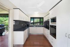 27-29 Millhouse Close Edmonton QLD 4869 $900,000s Thoughtfully designed with a multi-generational layout, you'll find great versatility in these family-friendly homes. Suitable for an Airbnb or perhaps blended families or maybe grandparents that need to be close by. The facade of this beautiful property sets the scene of a home that is relatively modern whilst still keeping its heritage origins throughout. A selection of indoor and outdoor living spaces offer casual living, seven bedrooms plus office, and four bathrooms within the two houses. There is a peaceful rear deck overlooking the hills and resort-style pool. Set on a 1612m2 fully fenced block. This is a rare opportunity to purchase one of the very best dual properties you will ever find. The owner of this property has spared no expense in ensuring that everything has been included for comfortable living in our great tropical climate. Both houses are in pristine condition and will suit the most fastidious buyer. The main house is on three levels and is constructed of split face concrete block, with a wide timber deck overlooking the gorgeous resort-style inground pool keeping the house and verandas cool all year round. • Four spacious bedrooms with built-ins and ensuite • Polished timber hardwood floors, every window has a tropical outlook. • Fully air-conditioned throughout • Spacious kitchen with a dishwasher and large windows • Open plan dining and lounge area • Huge outdoor deck overlooking the beautiful lush gardens • Cyclone shelter • Office and laundry downstairs The second house is two-story, nestled beside a separate entry from the main house. • Downstairs is the living, dining, and kitchen, • One bedroom and two-way bathroom, fully tiled and air-conditioned. • Upstairs is two other bedrooms with a two-way bathroom and timber floors & air-cones • Separate toilet with its own washbasin. • Lovely private patio overlooking a different part of the garden • Both homes have their separate entries and a soundproofed in between, both are wired for a generator. To the side of the property, you'll find a 2-bay 9m x 6m powered shed / workshop with remote controlled doors. There's a purpose-built concrete area between the shed and house suitable for storing boats, caravans or camper vans as well as a double garage. Entry through the electric gates. At this price this property won't be on the market for long so get in quick and view this unique tropical splendour while it's still available!!!!!!!!!!. Call Sharon Vyner today for a private inspection on 0417 778 606. FEATURES: • Air Conditioning • Built-In Wardrobes • Formal Lounge • Garden • Polished Timber Floor • Secure Parking..