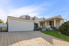 9 Albacore Drive Sorrento WA 6020 All offers presented by 6:00pm, Thursday 16th July 2020, unless sold prior. Ideal for a family that wants to live close to the beach but not too far from everything else, this elevated 5 bedroom 2 bathroom home will make for the perfect relaxing haven, once your own personal modern touches are added to it throughout. High raked ceilings and stylish light fittings grace a sunken formal lounge room off the entry, whilst the beautifully-tiled open-plan kitchen and dining area is also sunken and boasts a double storage pantry, a large fridge/freezer recess, double sinks, a dishwasher nook, a range hood, a Chef gas cooktop, Westinghouse oven, tiled splashbacks and outdoor access to the rear where a fantastic pitched patio and entertaining deck splendidly overlooks a sparkling below-ground solar-heated swimming pool with a bubbling spa and neighbouring tropical gardens. A carpeted family room can be found next to the dining space and features a corner wood fireplace and a split-system air-conditioning unit for all-seasons' comfort. Stepping up from the main living zone reveals a light, bright and spacious games room that is great for both kids and adults with its built-in bar/storage area, high ceilings, split-system air-conditioner, fan gleaming Bamboo floorboards, external poolside access and gorgeous double French doors for privacy. Also downstairs lies the main family bathroom with a separate bathtub and shower, as well as all five bedrooms - including a fifth bedroom-come-nursery next to a sublime front master suite, comprising of a walk-in wardrobe, another split-system unit, an intimate ensuite with a shower and toilet and a separate vanity/powder area for washing up. Upstairs, the large carpeted loft area can either be your study or another children's play area with roof storage access. Completing this wonderful package is a remote-controlled double lock-up garage with internal shopper's entry via the kitchen. Walk to the lovely Harman Park and Seacrest Village Shopping Centre at the bottom of the street, enjoy a leisurely stroll to nearby bus stops, the sprawling Seacrest Park Community Sporting Facility and Sacred Heart College and indulge in a very short commute to glorious Sorrento Beach, Hillarys Boat Harbour, the Sorrento Surf Lifesaving Club, coastal cafes and restaurants, more public transport, the freeway, Sorrento Primary School, Duncraig Senior High School, medical facilities and major shopping centres - Westfield Whitford City included. Sensual sea breezes await you here, there is no doubt about it! PROPERTY FEATURES; • North-facing backyard, patio and swimming-pool setting • Double-door entrance • Sunken formal lounge • Casual family room next to the kitchen/dining area • Separate elevated games room • Large upstairs study/loft area with roof access for storage • Carpeted downstairs bedrooms, including 2nd/3rd bedrooms with built-in robes • Practical tiled laundry with a storage cupboard and outdoor access • Second ground-floor toilet, separate from the main bathroom • Ample hallway linen storage • Internal shopper's entry via the double garage • Ducted-evaporative and split-system air-conditioning • Security-alarm system • Feature skirting boards • Gas hot-water system • Reticulation • 720sqm (approx.) block with two side-access gates • Built in 1987 (approx.) LOCATION FEATURES; • Walk to lush parks and the local shopping village • Close to bus stops, other shopping centres and schools - including Sorrento Primary, Sacred Heart College and Duncraig Senior High • Easy access to Sorrento Beach and Hillarys Marina • Minutes from coastal cafes and restaurants • Short commute to the freeway and other public-transport options..