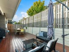 30/7 Border Drive North CURRUMBIN WATERS QLD 4223 This designer townhouse offers a unique, modern living environment in a very desirable location. The open plan living areas flow seamlessly to a large alfresco entertaining area overlooking a spacious fully fenced yard. • Quality kitchen with stainless steel appliances and gas cooktop; • Air conditioning throughout; • Generous master bedroom with ensuite and walk-in robe; • Main bathroom and ensuite have quality fixtures and fittings; • High ceilings, plenty of natural light and cross ventilation; • Double lock up garage plus plenty of storage throughout. Pet friendly, "Arcadia" is conveniently located minutes from popular Currumbin and Palm Beach waterways, quality schools, within the PBC catchment area and is close to shopping complexes and all amenities.
