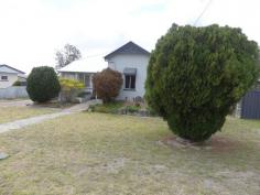 34 Pierpoint St Stanthorpe QLD 4380 $207,000 34 Pierpoint Street Stanthorpe a well presented and appointed 3 bedroom home ideal for first home investor or rental property. This home is well positioned an easy walk to main street parks and Stanthore's most popular restaurants. Comprising 3 large bedrooms open plan living kitchen and dining room. Approximate 5 year old modern kitchen with plenty of bench space and electric stove. North facing sunroom with views over main street of Stanthorpe. Front entry sitting room. one bathroom with wc plus wc and wash room outside. Gas heating Set on a generous 873m2 allotment with garage and carport. This home is in very ggod condition and has been repainted in recent years. Asking a very reasonable $207,000. Contact David Schnitzerling on 0418717979 for an inspection.